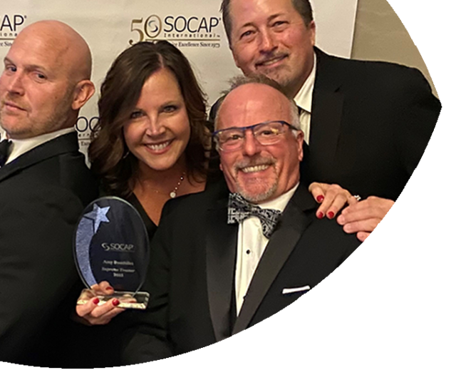 Alta Resources' Amy Bouthlilet, Patrick Nicholson, Mark Strassburg, and Steve Seidl celebrate Amy receiving the 2023 SOCAP Impact Supreme Trainer Award